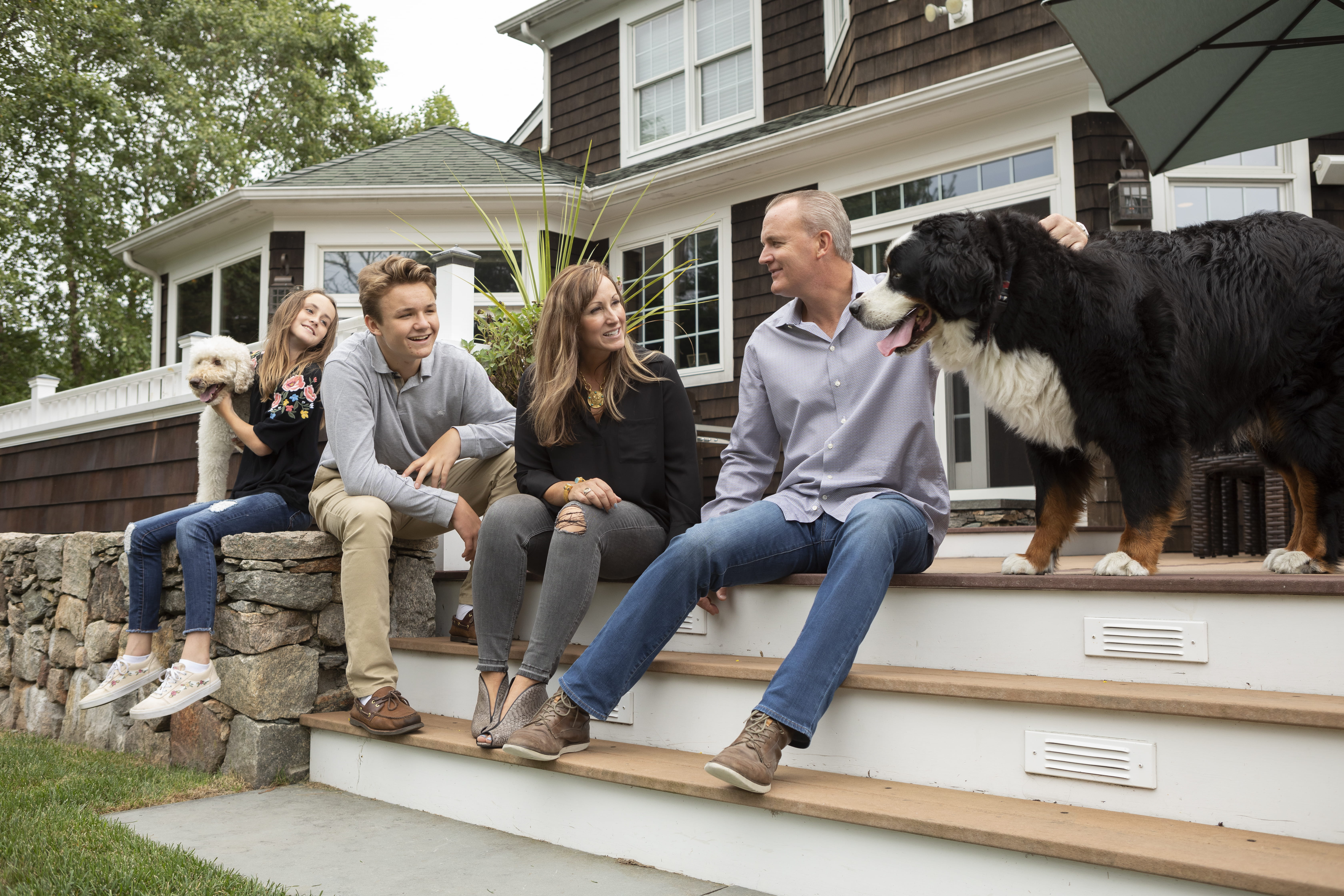 Logan_and_family_on_deck_stairs3_horiz