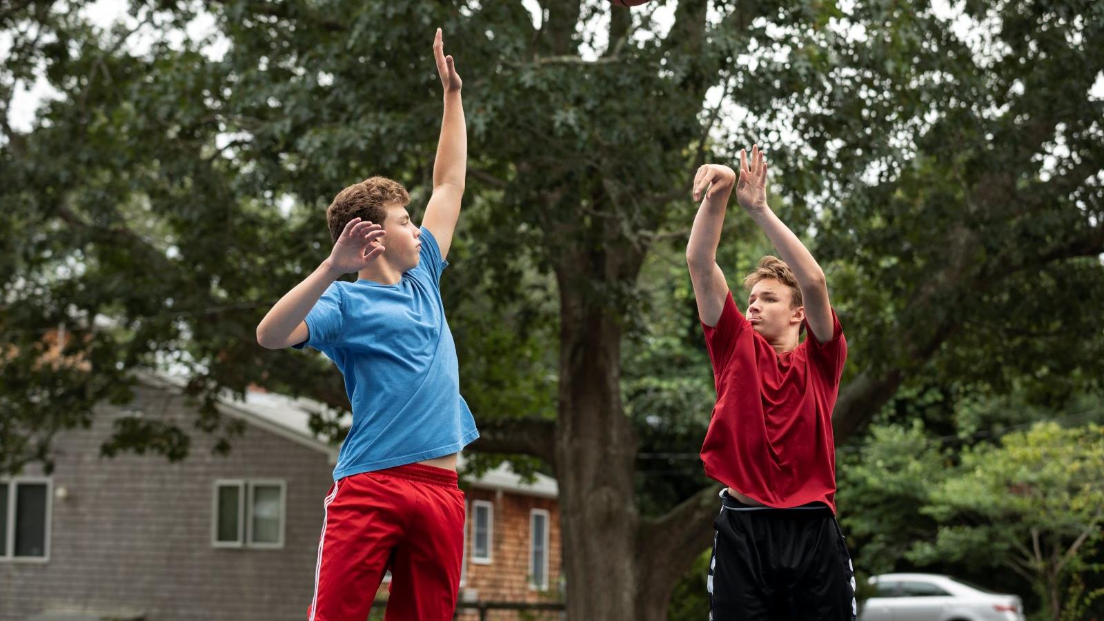Logan_with_friend_playing_basketball4_horiz